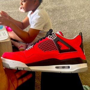 Air Jordan 4s retro toro bravo  size 8.5 in women